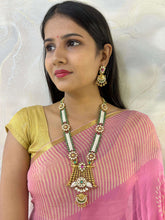 Deepanita Long Antique Gold Necklace Set With Kundan Brooches And Pearls handcrafted for Indian Weddings.