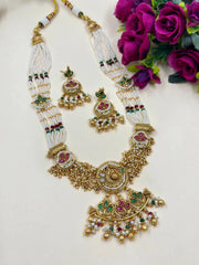 Madhulika Long Antique Gold Jewellery Necklace Set With Pearls handcrafted for weddings