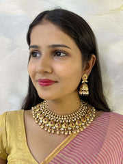 Swarna Gold Plated Antique Gold Necklace Set studded with kundan.