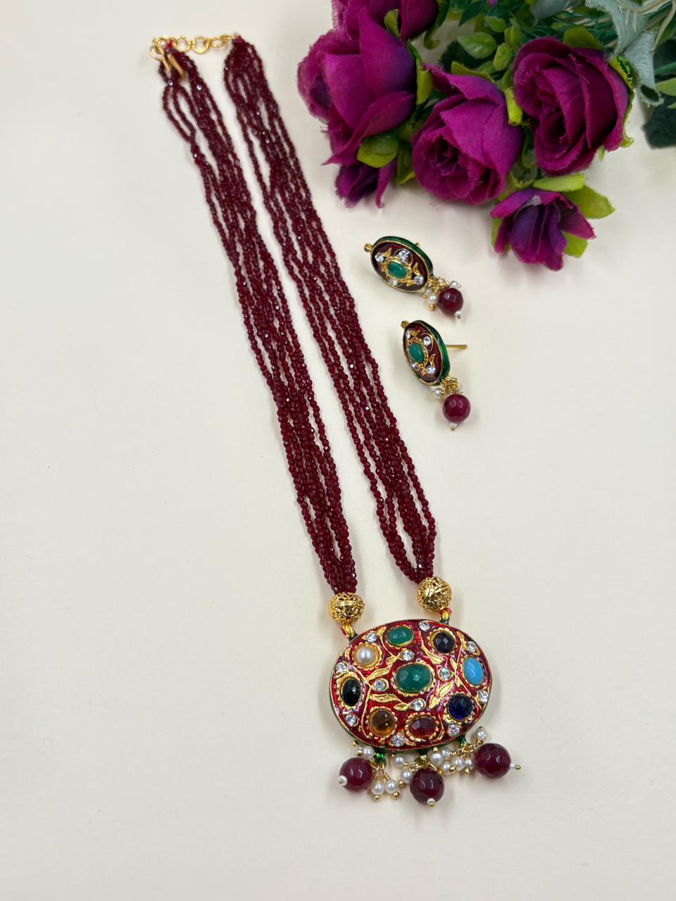 Traditional Gold Plated Multi Color Navratna Pendant Necklace Set With Layered Maroon Beads 