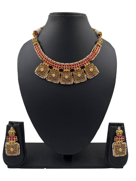 Divyam Designer Antique Jewellery Golden Necklace Set.