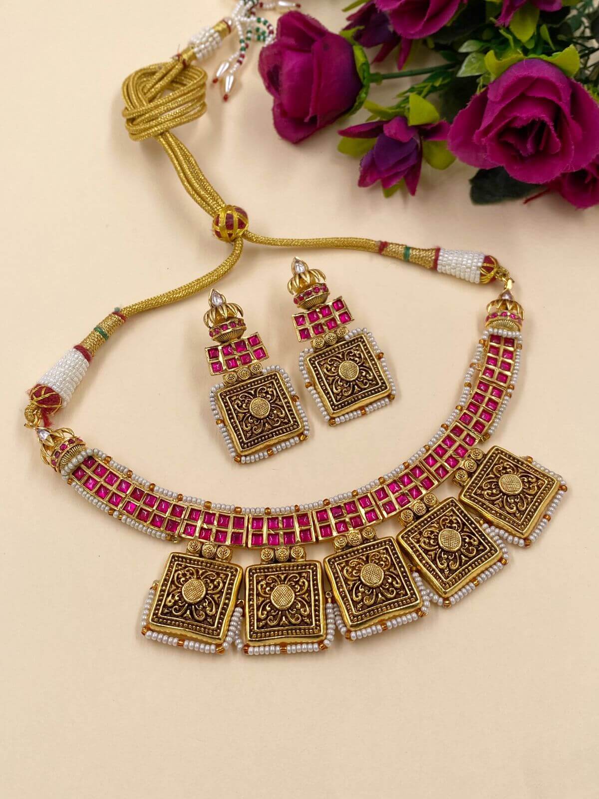 Divyam Designer Antique Jewellery Golden Necklace Set.