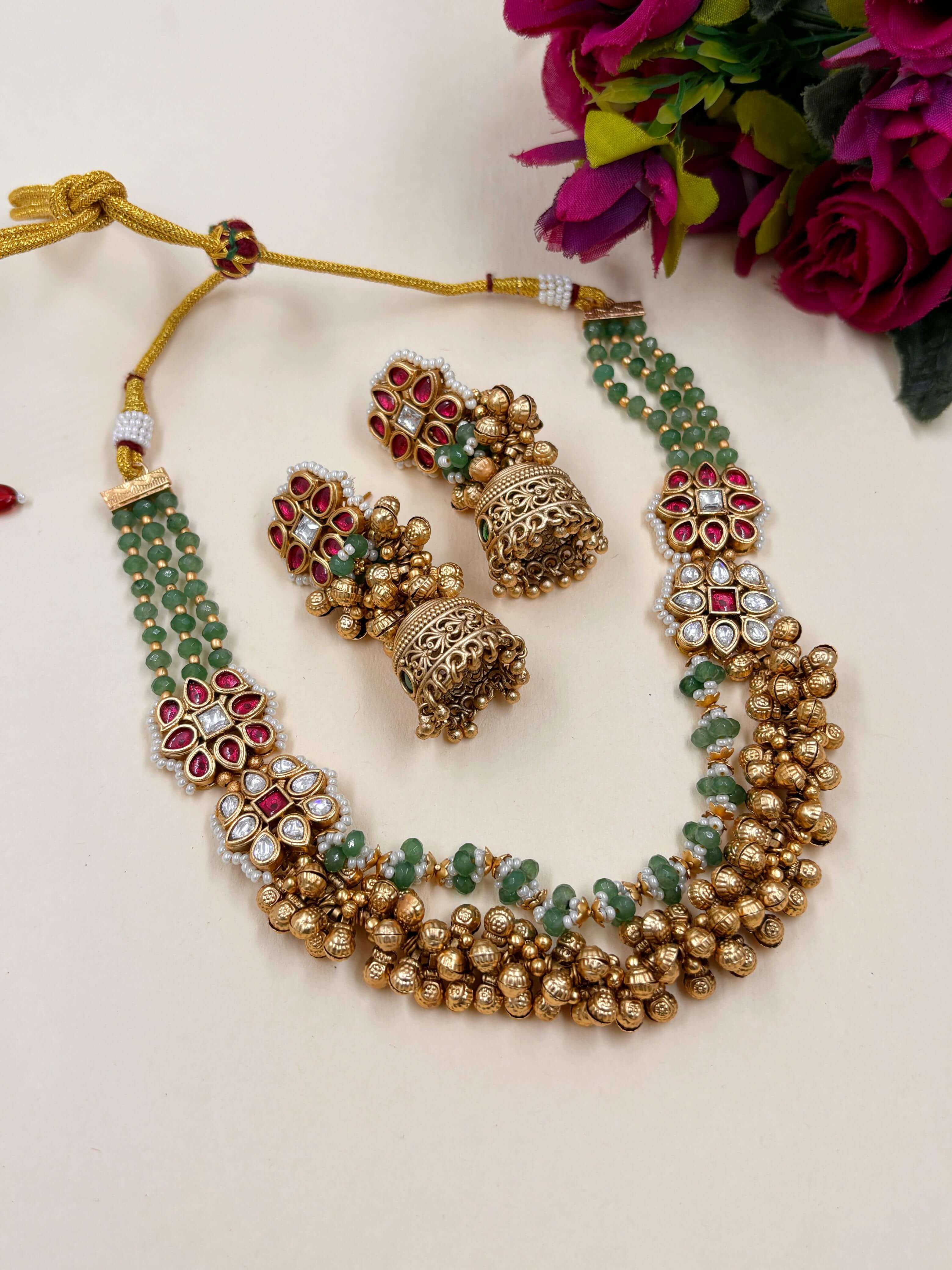 Urvashi Short Antique Green Beads Necklace With Kundan Brooches