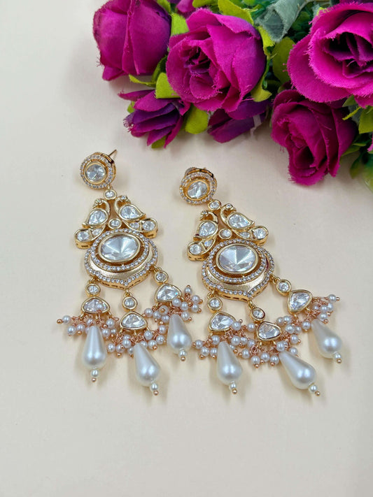 Designer Modern Look Long Kundan Polki Dangler Earrings with Studded polki and Ad stones with carat plating . Handcrated for both Indian and Western wear 