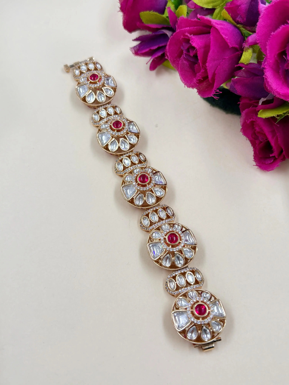 Radhika Beautiful Rose Gold Finish Kundan Polki Gajra Bracelet For Ladies