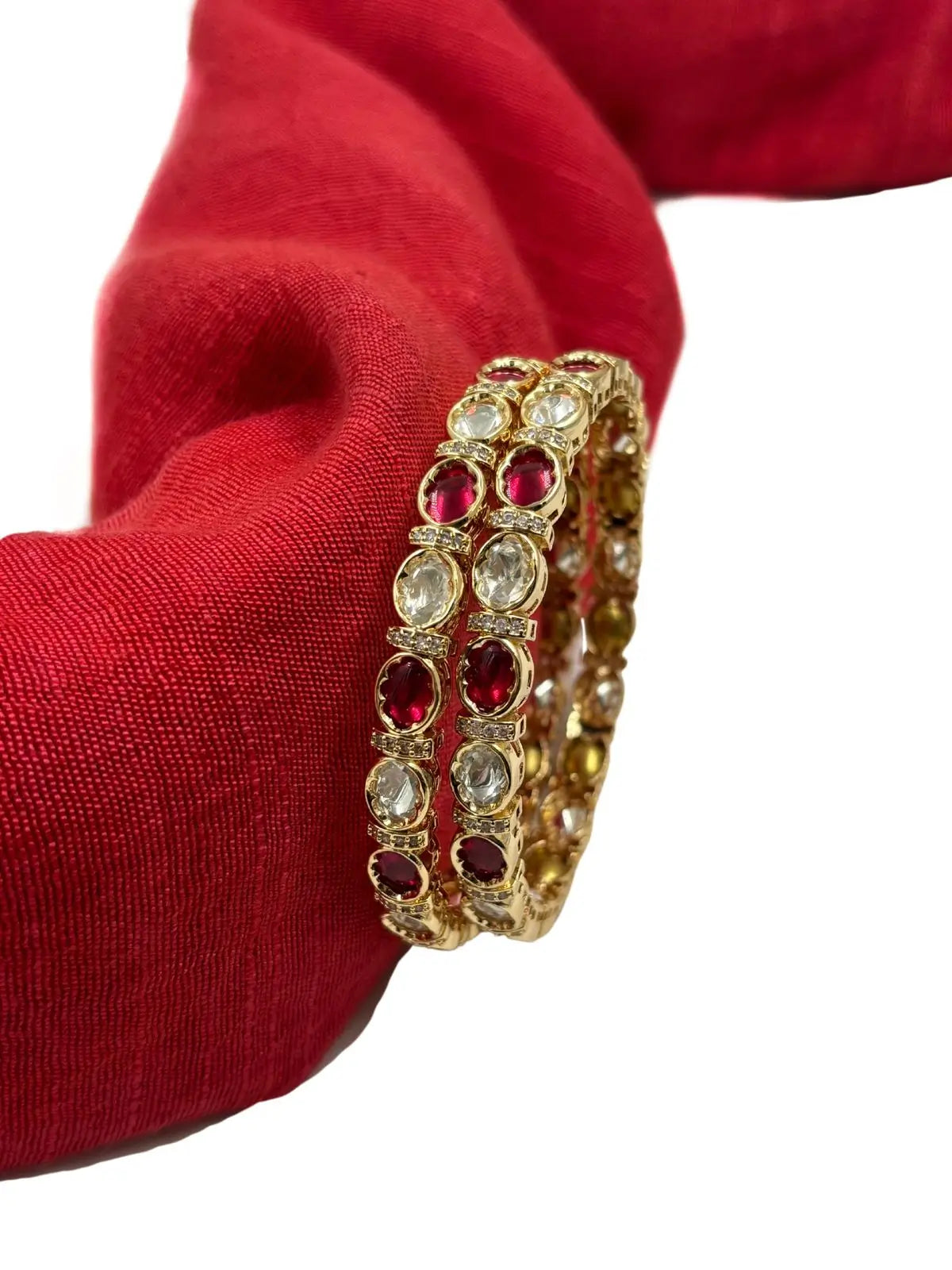 Beautiful Rose Gold Polish Thin Ruby Kundan Bangles for women online 