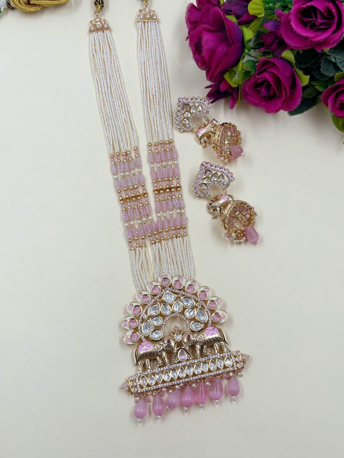 Artificial Long Polki Studded Elephant Design Temple Necklace Set with baby pink beads 