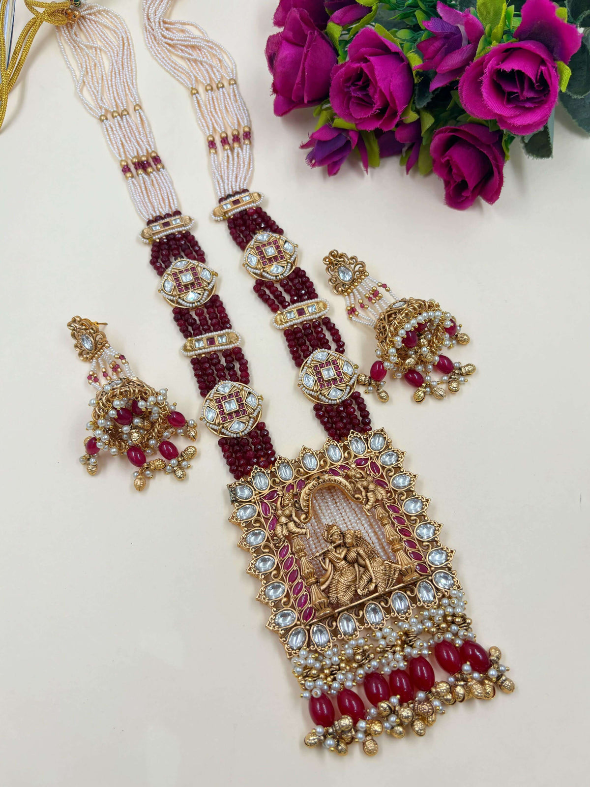 Suhasini Long Antique Golden Radha Krishna Temple Necklace Set With Maroon  Layered Beads