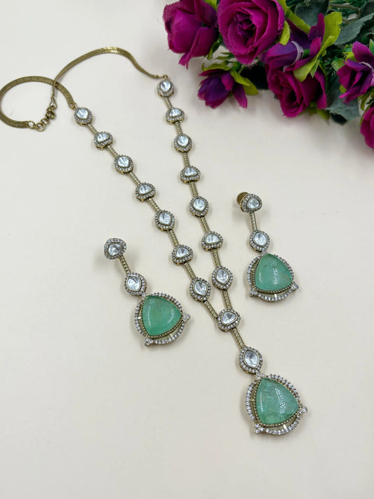 Aarya Modern Look Long Moissanite Polki Victorian Jewellery Necklace Set in mint green color 