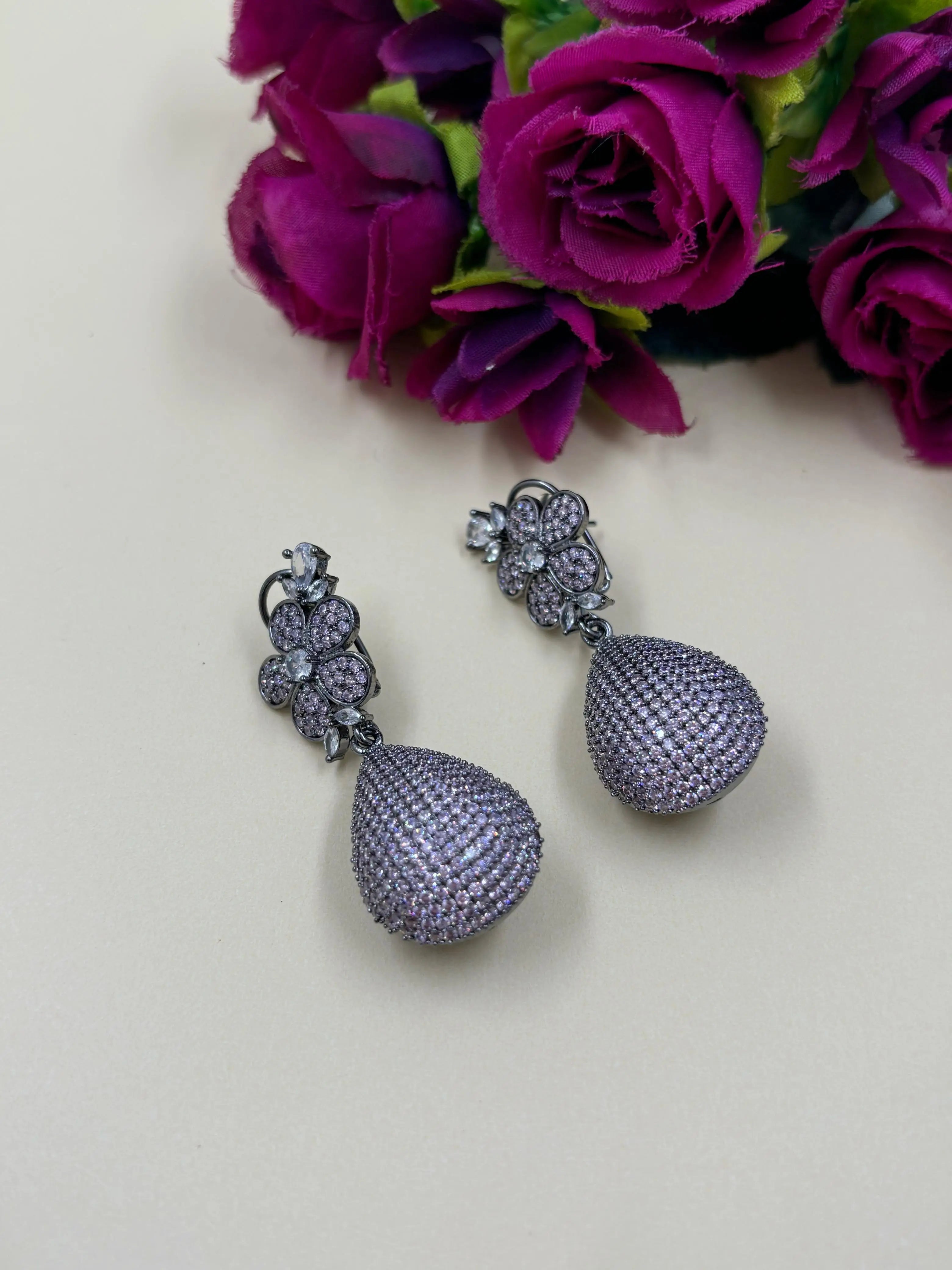 Contemporary Flower Design Zircon Dangler Earrings For Women in light purple color handcrafted for indian and western wear