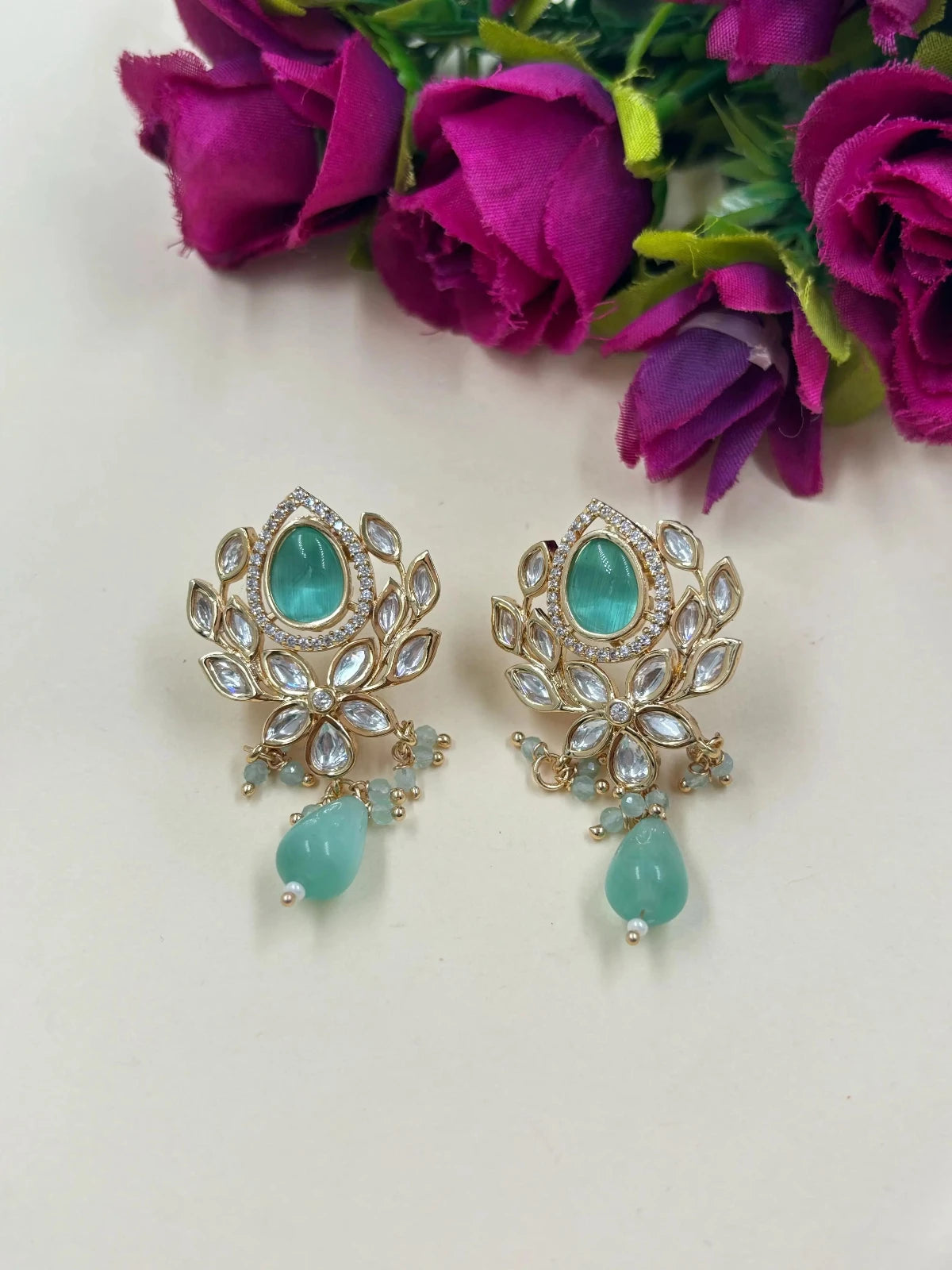 Designer Flower Design Party Wear Mint Green Kundan Polki Stud Earrings