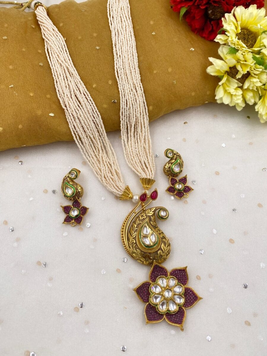 Designer Antique Floral Kundan Pendant With Pearls Necklace Set Antique Golden Necklace Sets