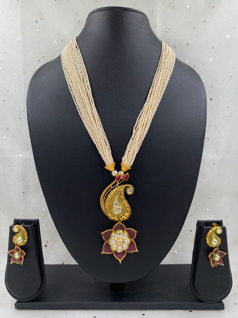 Designer Antique Floral Kundan Pendant With Pearls Necklace Set Antique Golden Necklace Sets