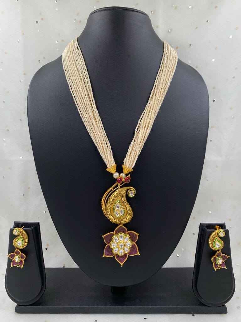 Designer Antique Floral Kundan Pendant With Pearls Necklace Set