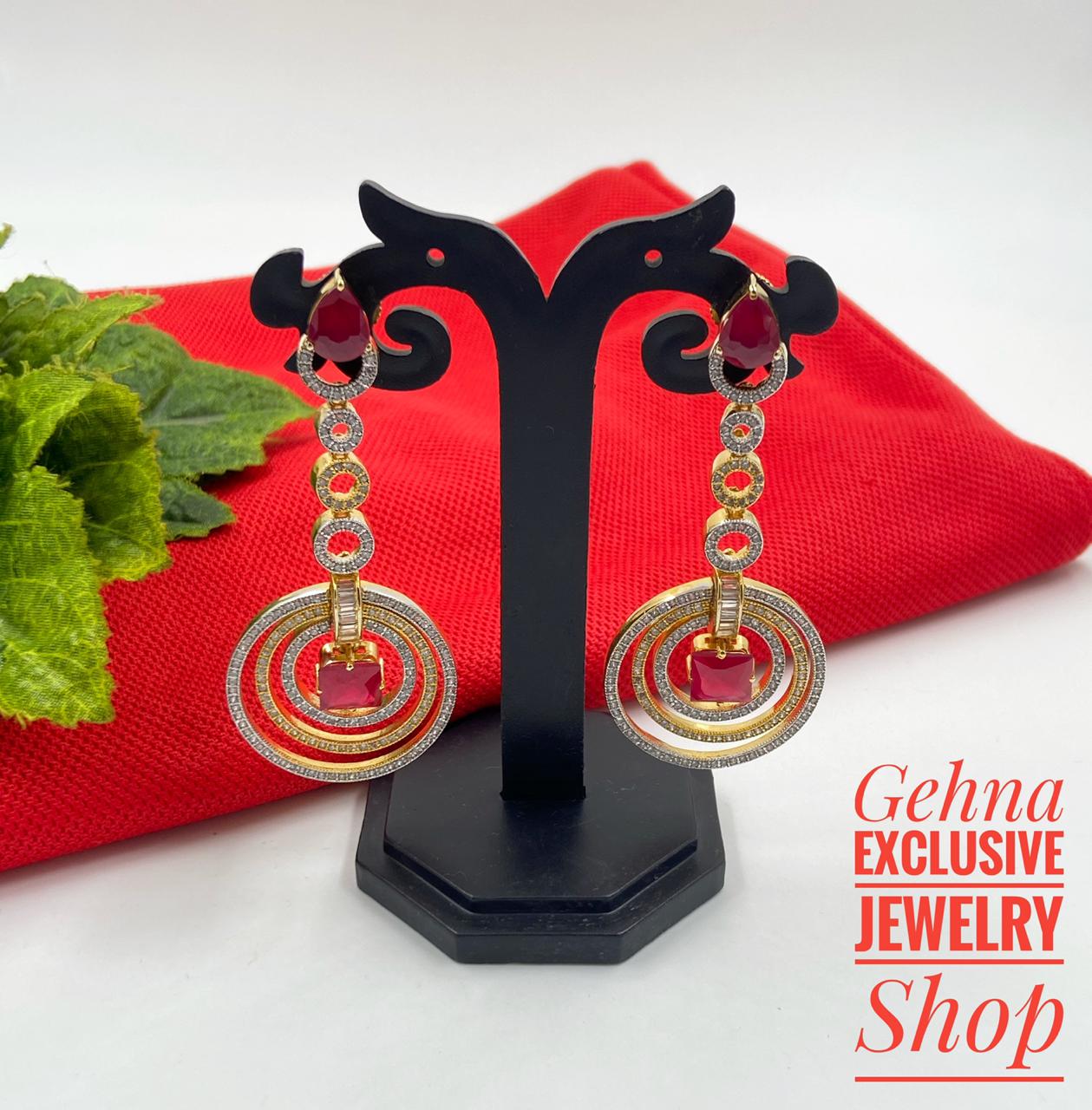 Designer Golden Long Ruby Stone Cubic Zircon Danglers By Gehna Shop Ziron Earrings