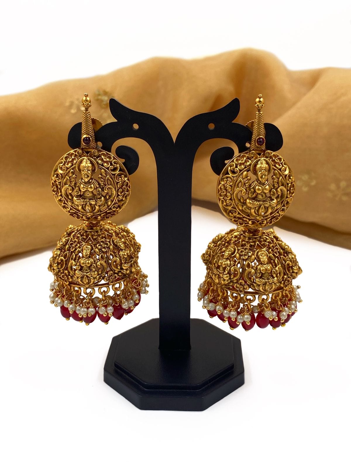 Gold Plated Goddess Lakshmi Temple Jhumka Earrings By Gehna Shop Jhumka earrings