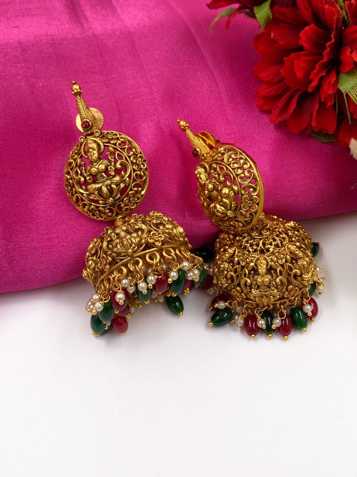 Gold Plated Goddess Lakshmi Temple Jhumka Earrings By Gehna Shop Jhumka earrings