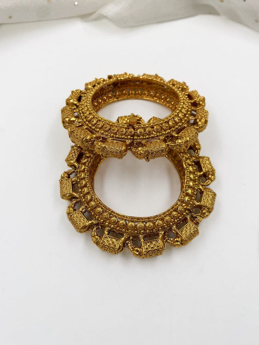 Traditional Gold Plated Antique Golden Elephant Bangles By Gehna Shop Antique Golden Bangles