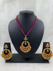 Traditional Gold Plated Ruby Kundan Pendant With Crystal Beads By Gehna Shop Antique Golden Necklace Sets