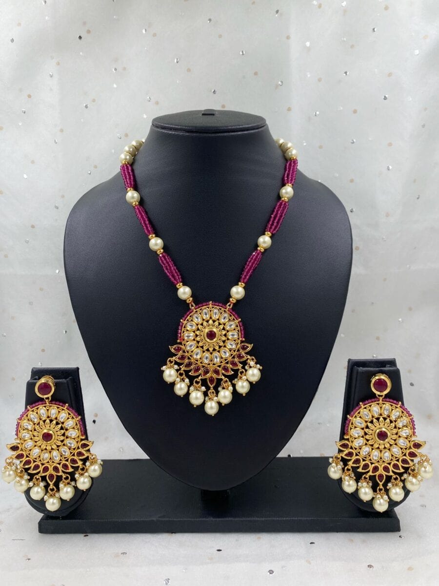 Traditional Gold Plated Ruby Kundan Pendant With Ruby Crystal Beads By Gehna Shop Kundan Necklace Sets